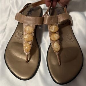 Chic Tan Sandals with Decorative Accents